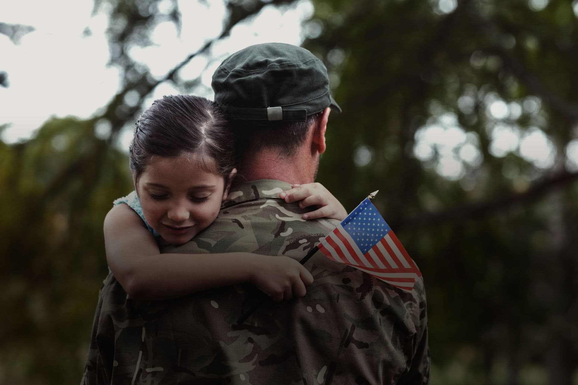 Military Father Holding Daughter